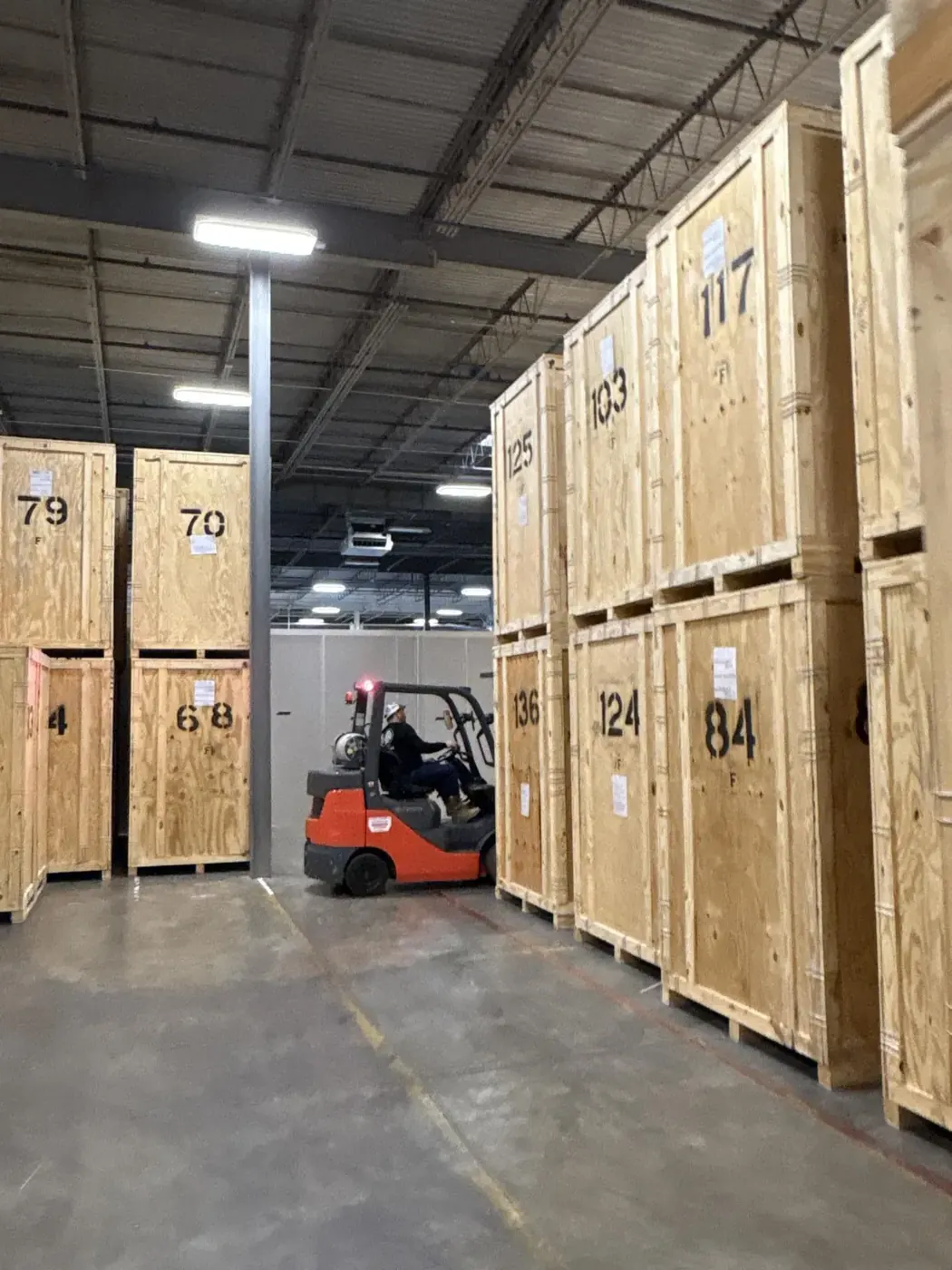 Customer belongings stored in sealed, numbered vaults at All Dry’s warehouse