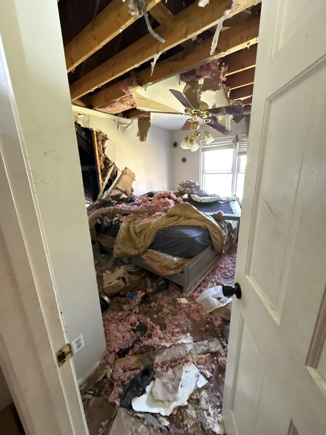 Bedroom ceiling collapsed after a house fire in metro Atlanta