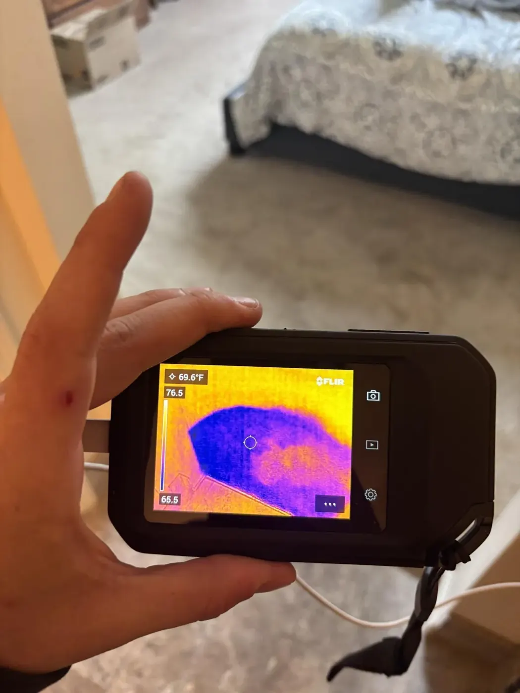 Thermal imaging scan showing wet carpet during a moisture inspection in Marietta, GA